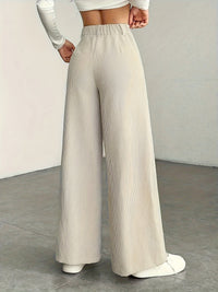 Nora | High-Waisted Wide-Leg Trousers in Apricot